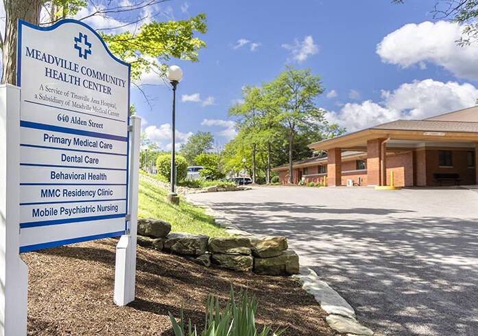 Alden Street facility with department listing on sign